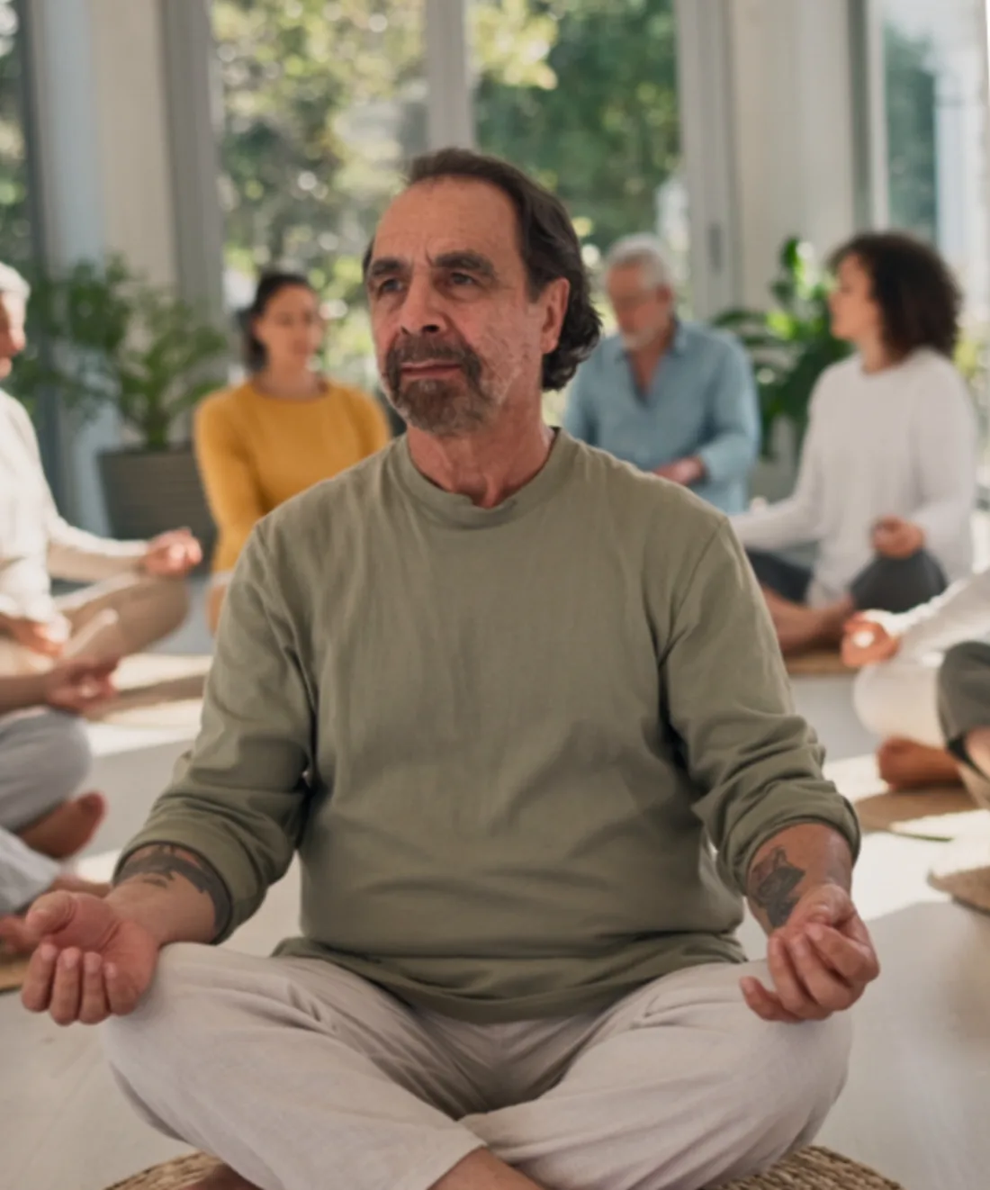 Juan Pablo Ochoa in a seated meditation with a group